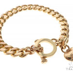 14K Yellow Gold Cuban Link Bracelet With Heart Charm And Toggle Clasp 65650 - Image 2